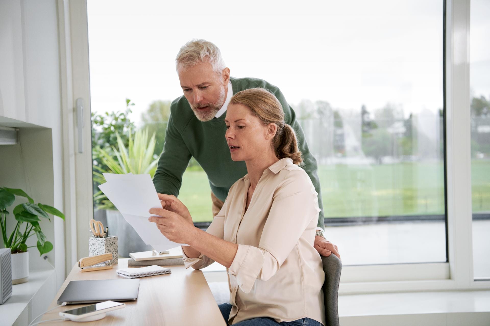 Woman and man in the home office